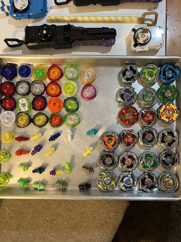 Used beyblade parts bit - x,